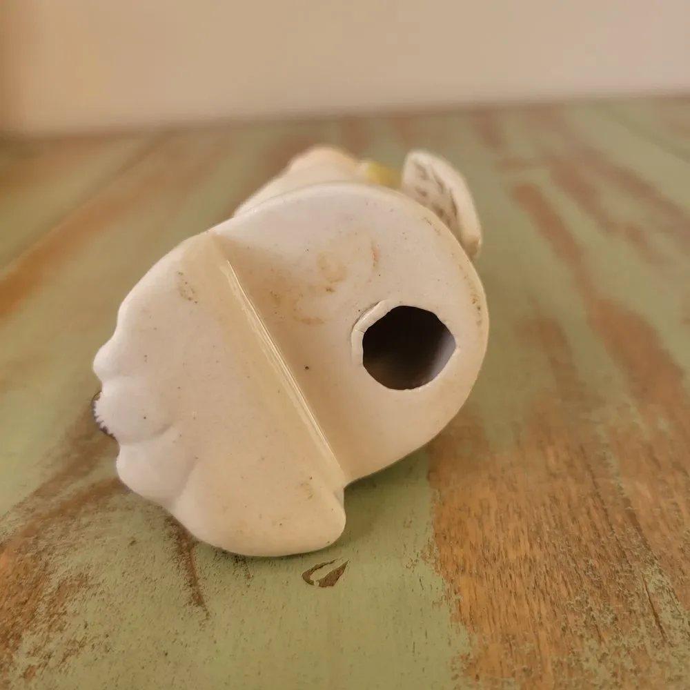 Ceramic Angel Figurine with Flowers